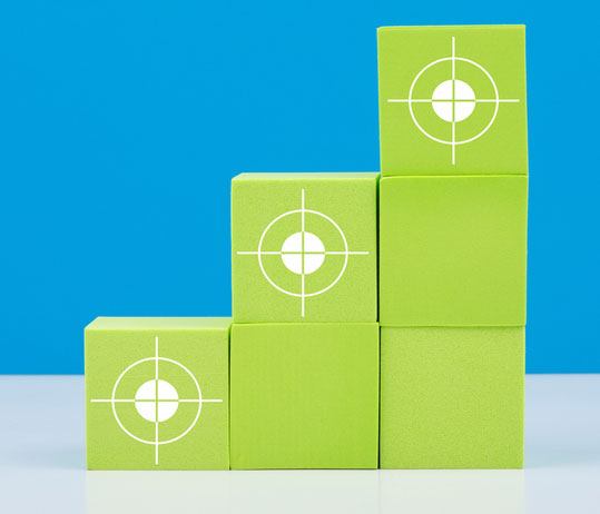 Three columns of increasing blocks stands for 5090 Marketing's 3 services.