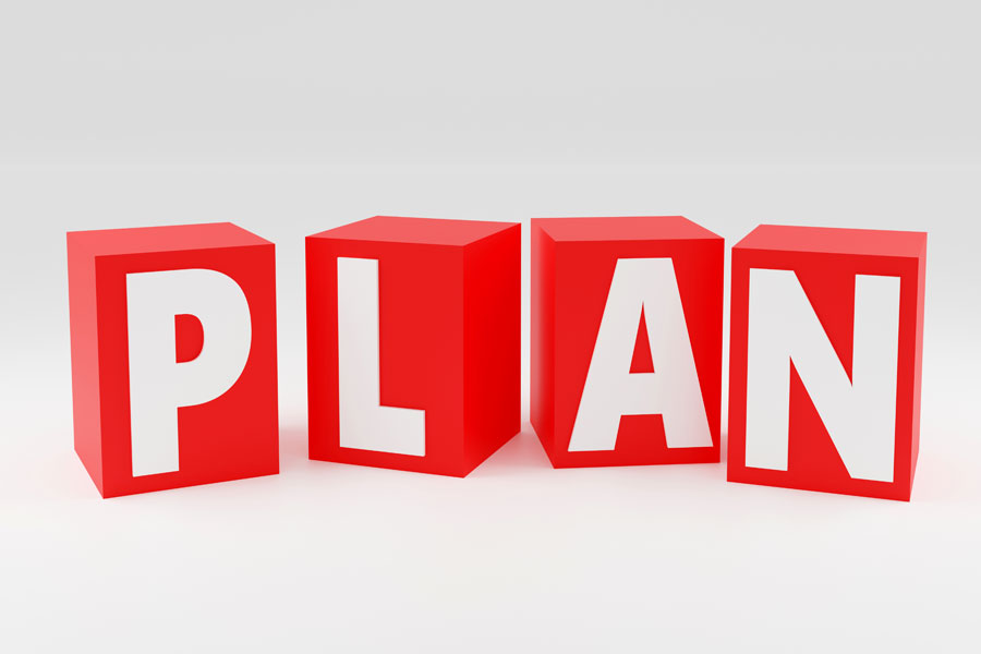3D word plan in white on red blocks stands for website copy planning for home care.