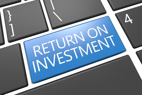 Return on investment written on blue computer key.