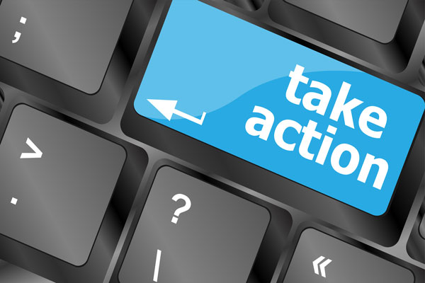 Words take action on computer keyboard key.